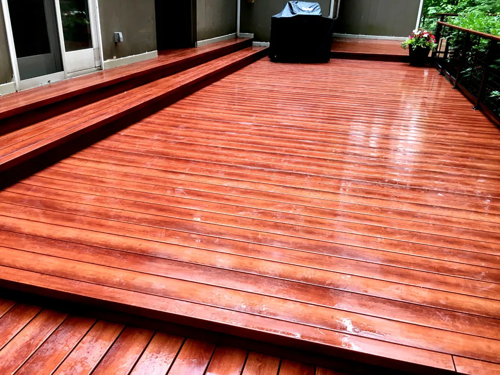 Zuri patio featuring Feeney cable railing by Miles Deck Construction - Photo 2