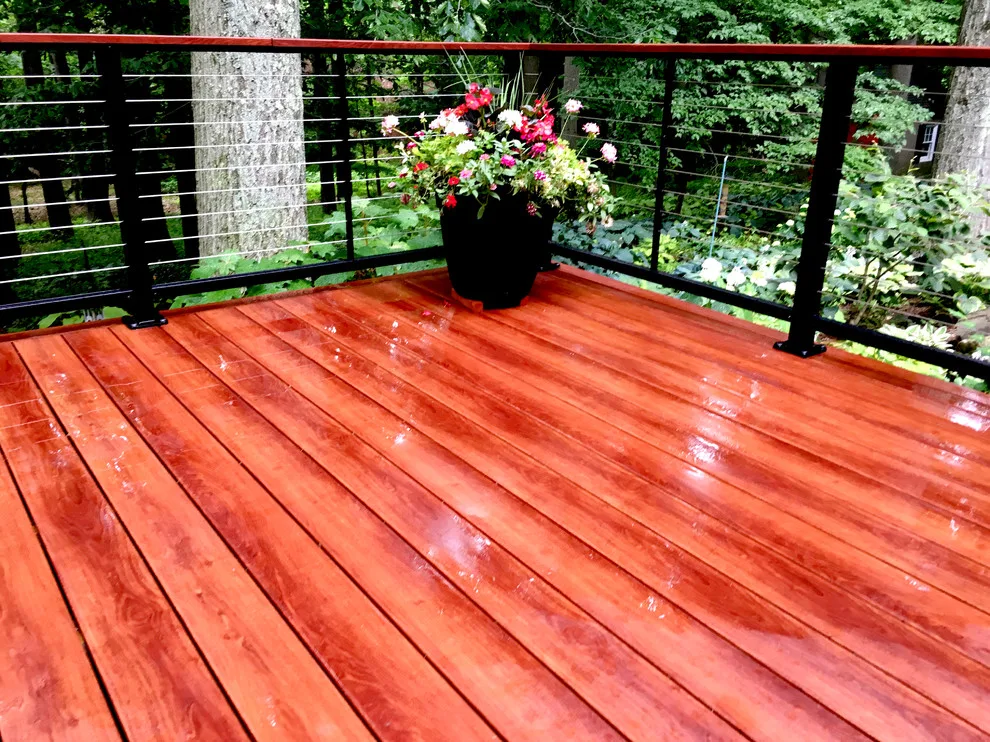 Zuri patio featuring Feeney cable railing by Miles Deck Construction - Photo 4