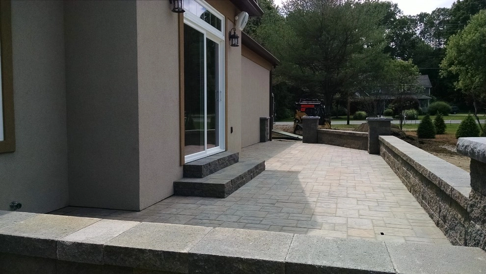 Patio Area, Wall Stone & Fire Pits by Pure Perfection Landscape And Services Inc - Photo 8