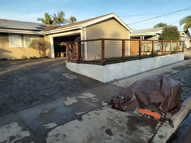 front yard hardscape by Quetzal Landscapes, Inc. - Photo 9