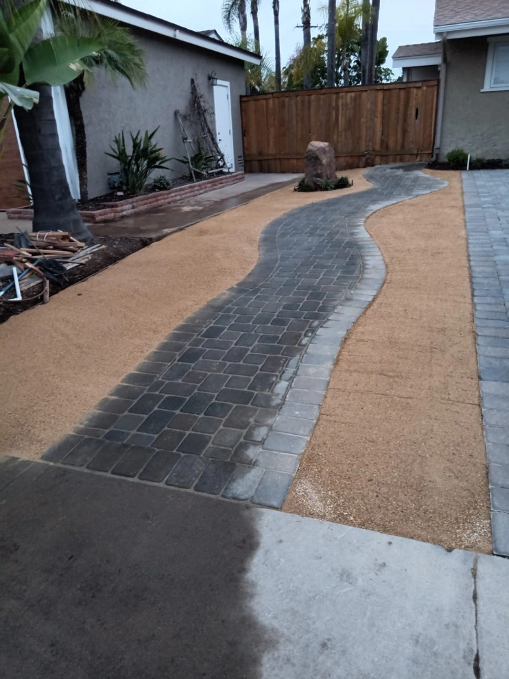 front yard hardscape by Quetzal Landscapes, Inc. - Photo 12