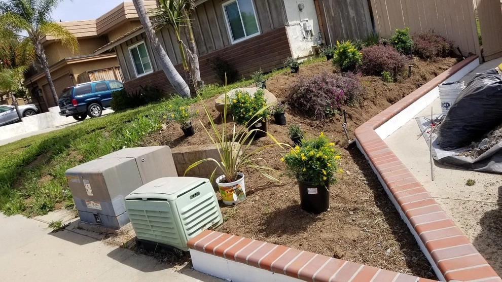 Front yard Retaining wall by Quetzal Landscapes, Inc. - Photo 3