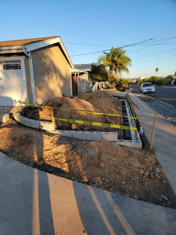 front yard hardscape by Quetzal Landscapes, Inc. - Photo 8