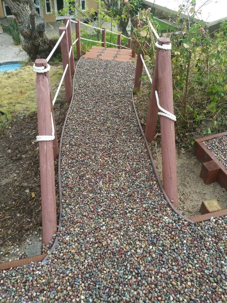 Keystone legacy steps with Jelly Bean pebble by Quetzal Landscapes, Inc. - Photo 2