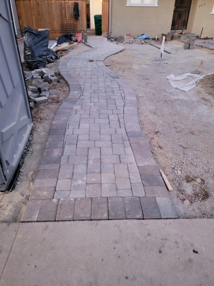 front yard hardscape by Quetzal Landscapes, Inc. - Photo 5