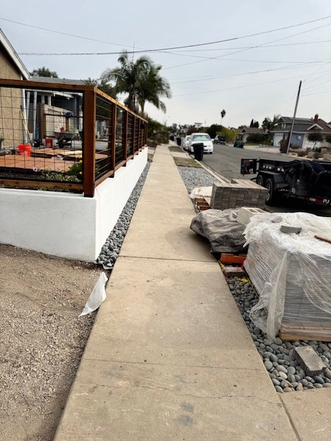 front yard hardscape by Quetzal Landscapes, Inc. - Photo 10