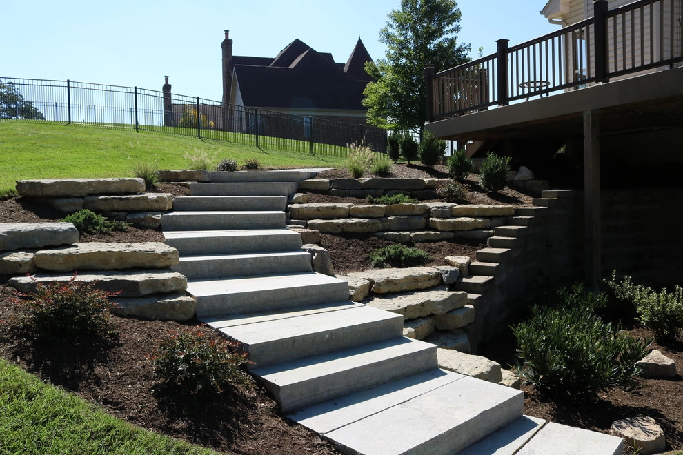 Expansive Outdoor Patio with Putting Green & Fire Pit by Quiet Village Landscaping - Photo 3