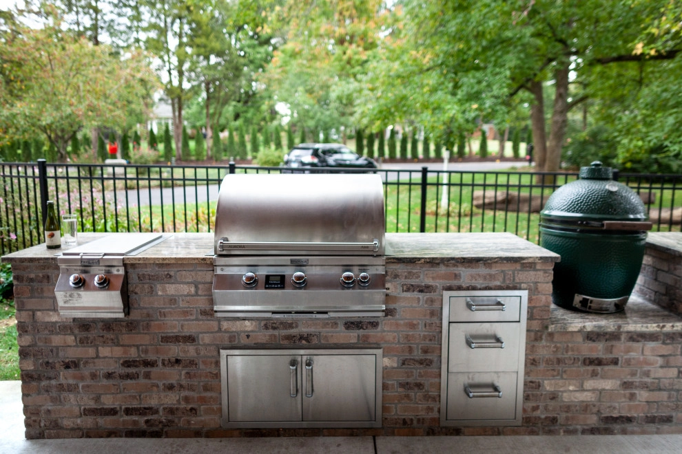 Elegant Outdoor Kitchen, Bar & Dining Space by Quiet Village Landscaping - Photo 3