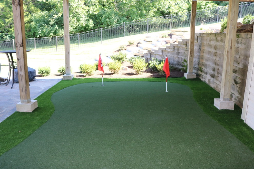 Expansive Outdoor Patio with Putting Green & Fire Pit by Quiet Village Landscaping - Photo 5