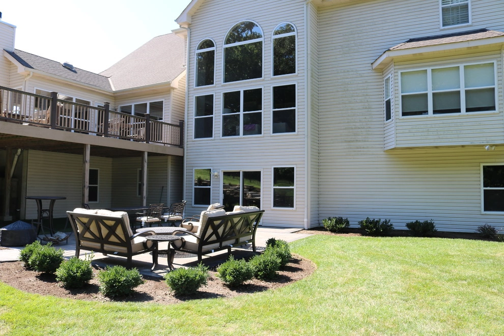Expansive Outdoor Patio with Putting Green & Fire Pit by Quiet Village Landscaping - Photo 7