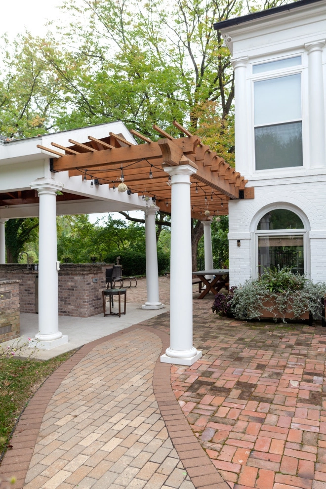 Elegant Outdoor Kitchen, Bar & Dining Space by Quiet Village Landscaping - Photo 8