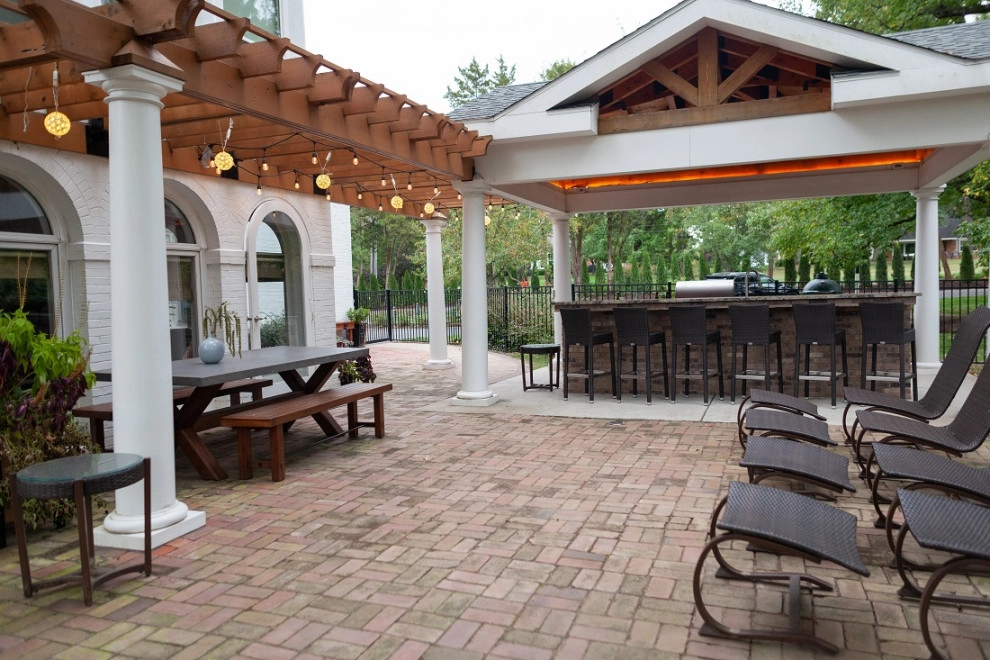 Elegant Outdoor Kitchen, Bar & Dining Space by Quiet Village Landscaping - Photo 2
