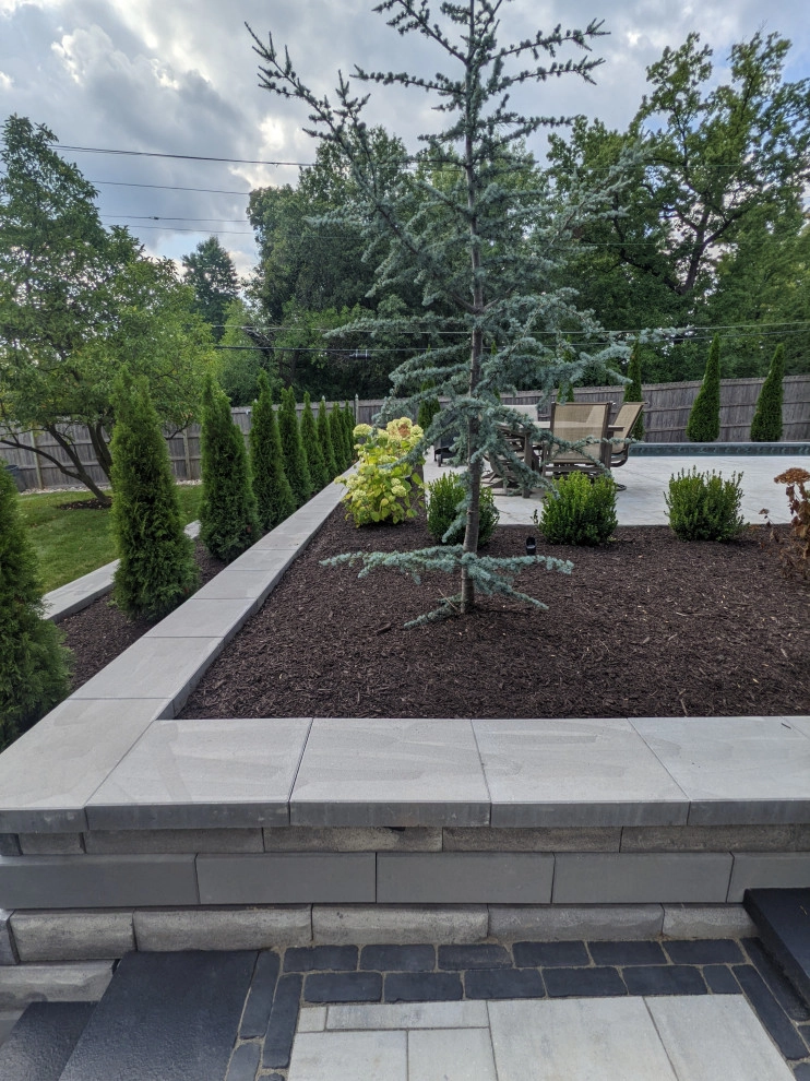 Modern Poolside Entertaining Space with Outdoor Kitchen by Quiet Village Landscaping - Photo 9