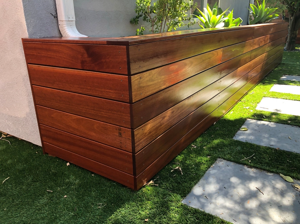 Kayu wood 8’ high and gate with stain Cellar by RainforestLA,inc. - Photo 6
