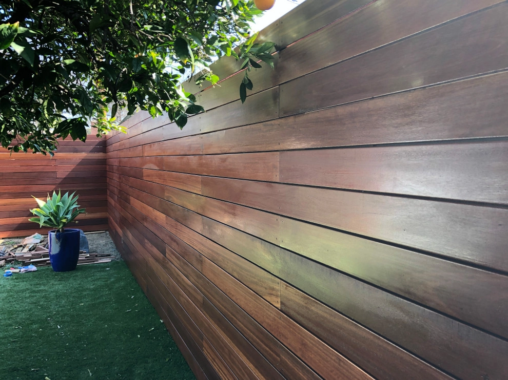 Kayu wood 8’ high and gate with stain Cellar by RainforestLA,inc. - Photo 4