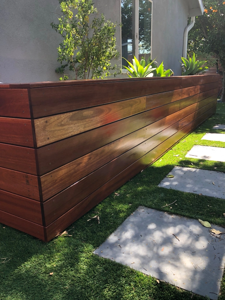 Kayu wood 8’ high and gate with stain Cellar by RainforestLA,inc. - Photo 11
