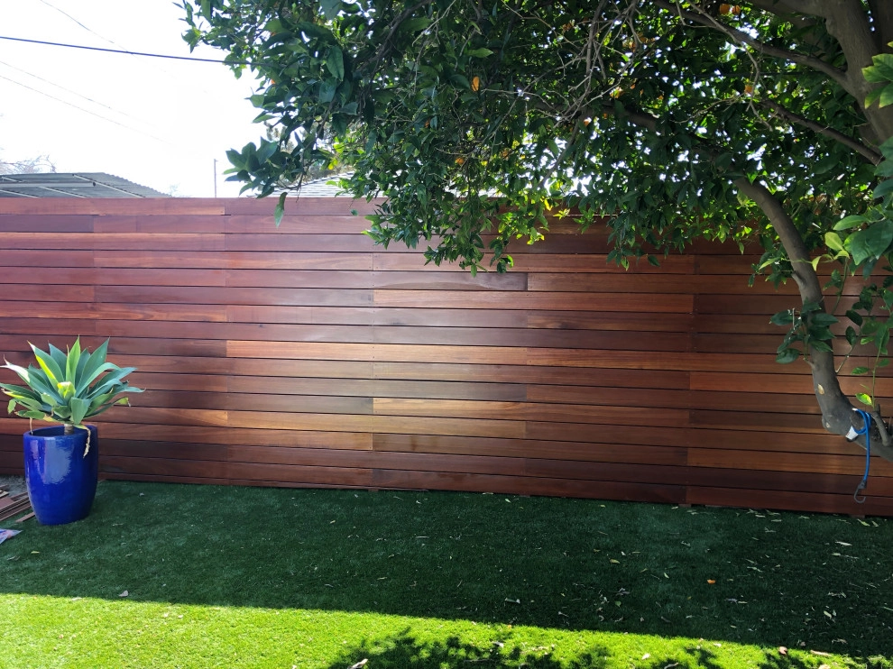 Kayu wood 8’ high and gate with stain Cellar by RainforestLA,inc. - Photo 12