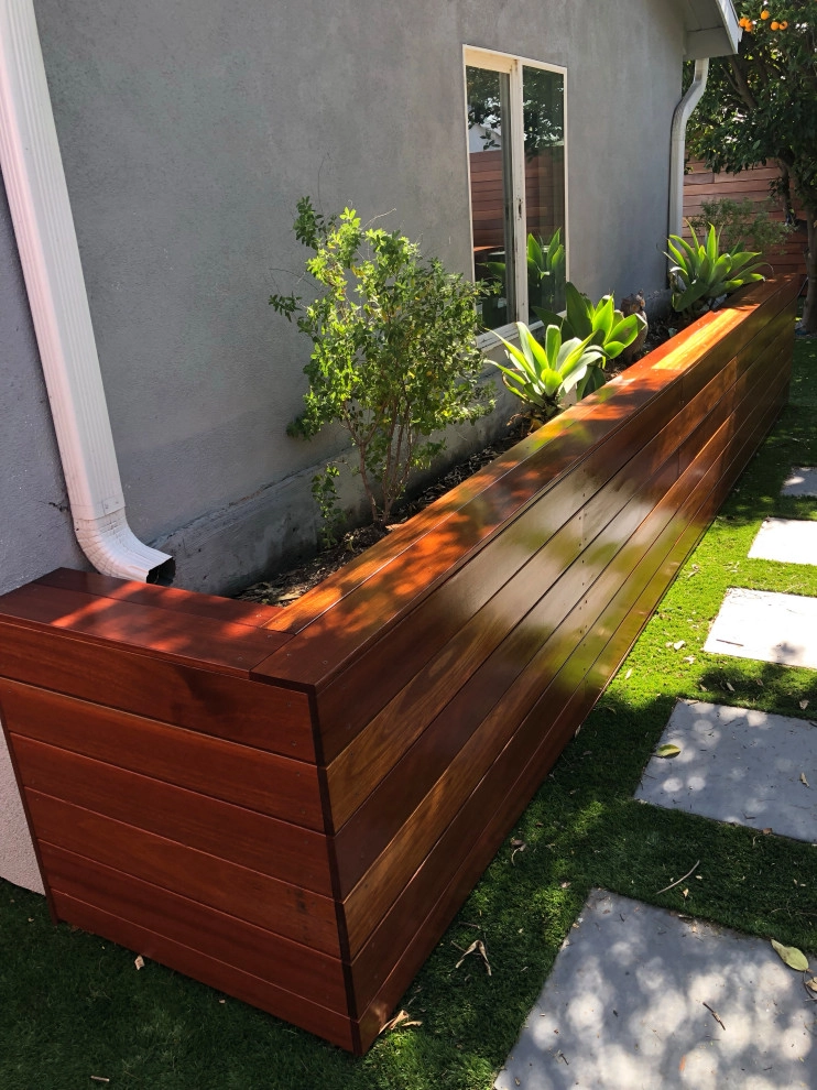 Kayu wood 8’ high and gate with stain Cellar by RainforestLA,inc. - Photo 5
