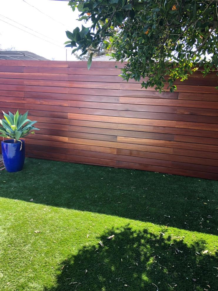 Kayu wood 8’ high and gate with stain Cellar by RainforestLA,inc. - Photo 2