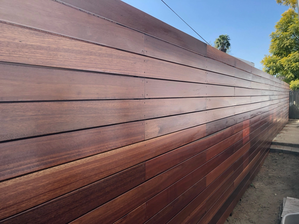 Kayu wood 8’ high and gate with stain Cellar by RainforestLA,inc. - Photo 9