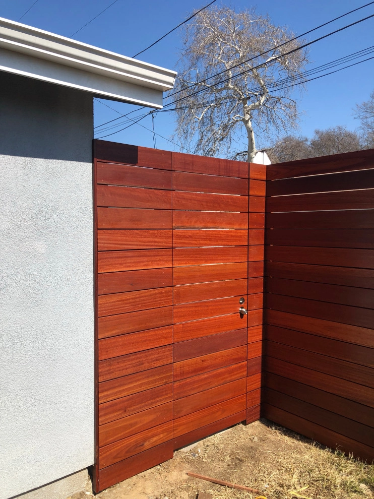 Kayu wood 8’ high and gate with stain Cellar by RainforestLA,inc. - Photo 3