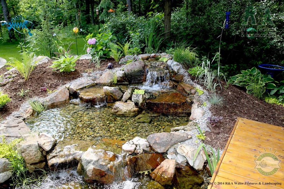 Kalamazoo Water Feature - Backyard Ponds with Bridge by R&A Landscaping - Photo 12