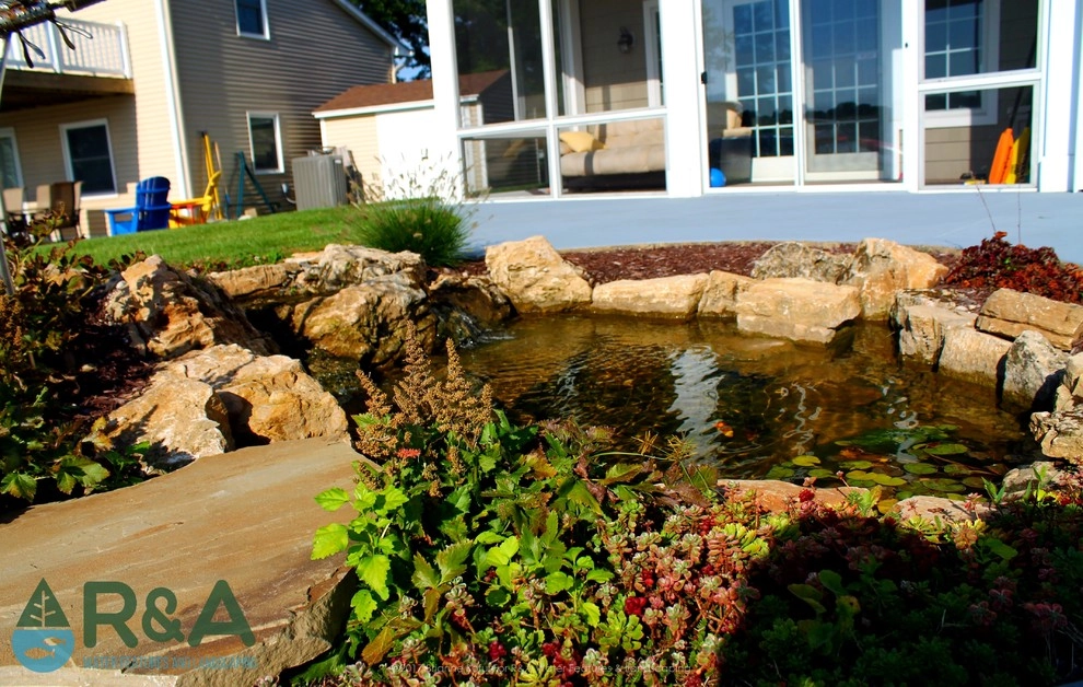 Eagle Lake Pond Installation Mattawan MI by R&A Landscaping - Photo 8