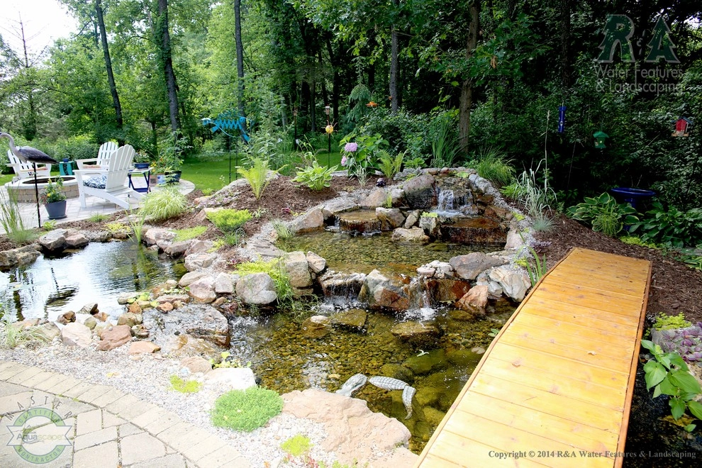 Kalamazoo Water Feature - Backyard Ponds with Bridge by R&A Landscaping - Photo 3