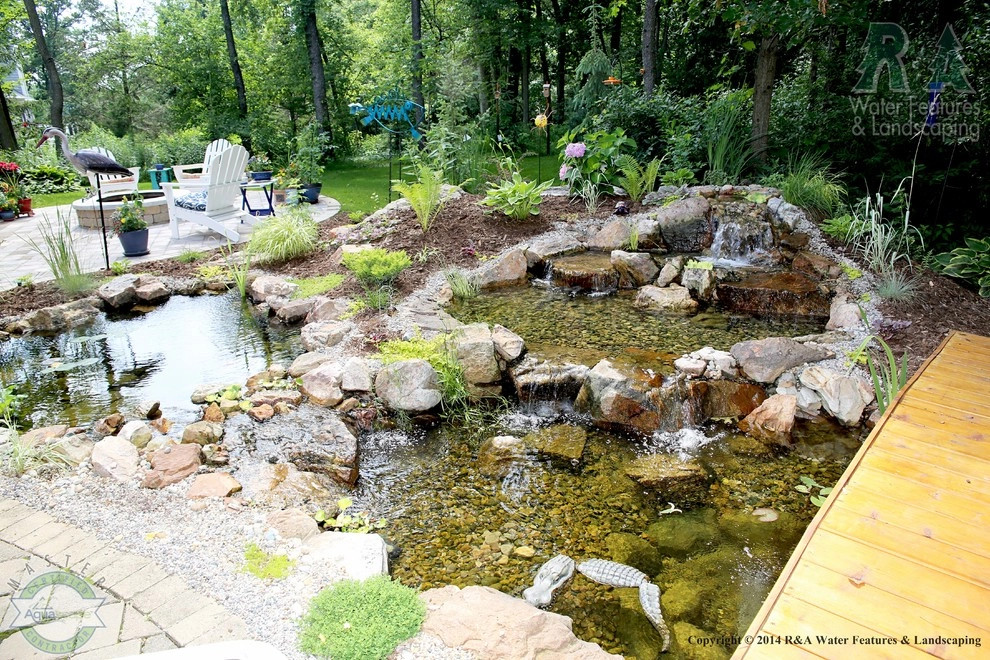 Kalamazoo Water Feature - Backyard Ponds with Bridge by R&A Landscaping - Photo 5