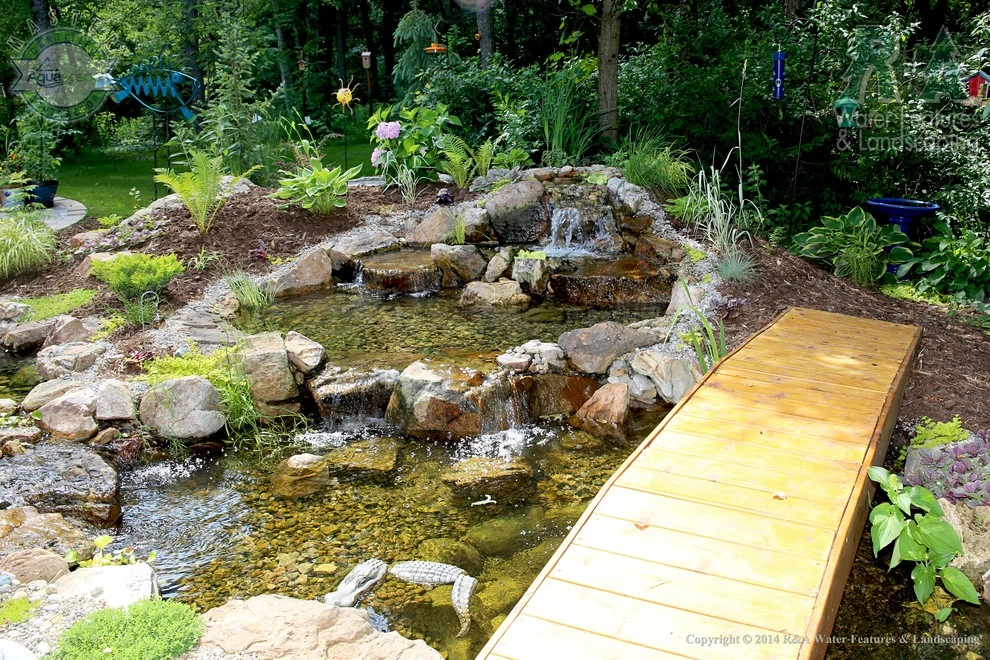 Kalamazoo Water Feature - Backyard Ponds with Bridge by R&A Landscaping - Photo 6
