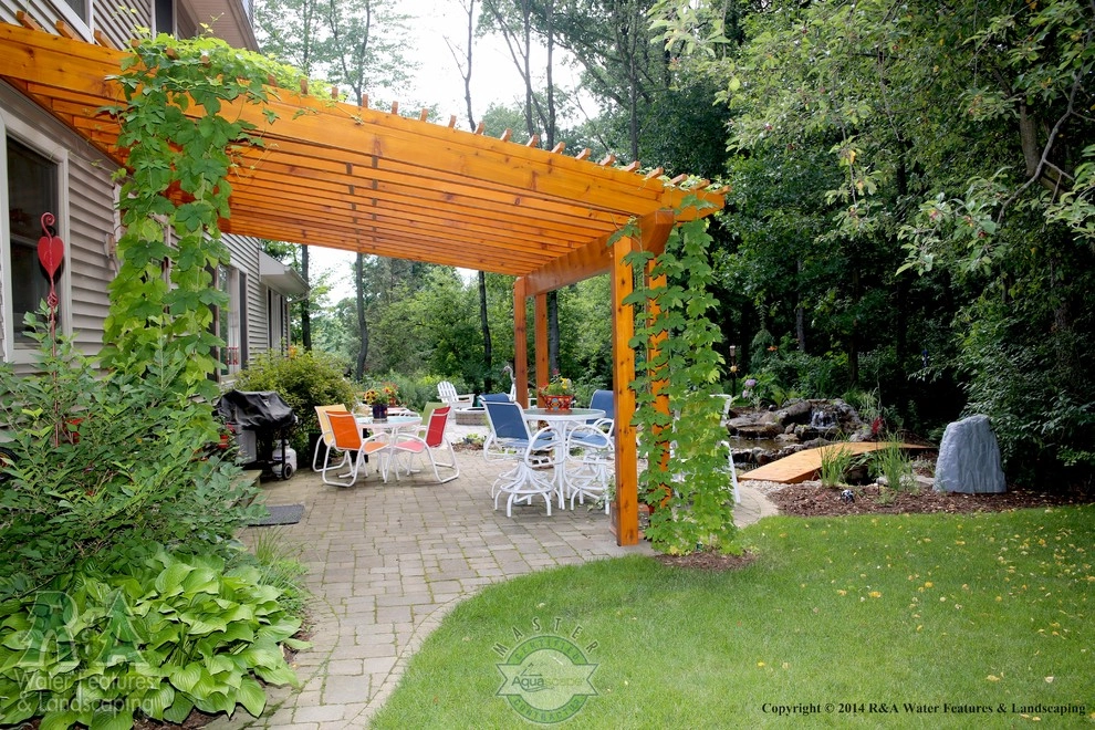 Kalamazoo Water Feature - Backyard Ponds with Bridge by R&A Landscaping - Photo 7