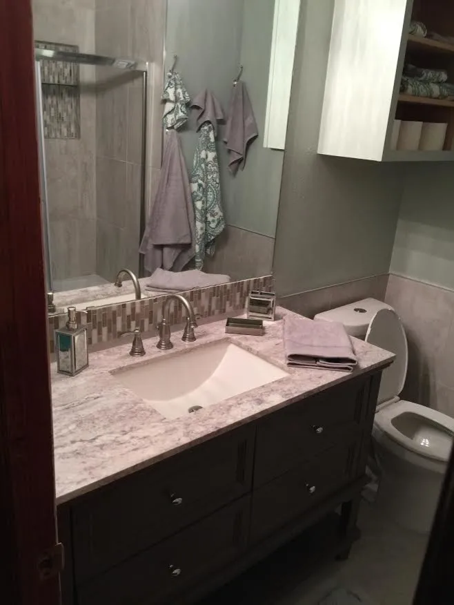Compact Bathroom Makeover by The Glover Group, LLC - Photo 2