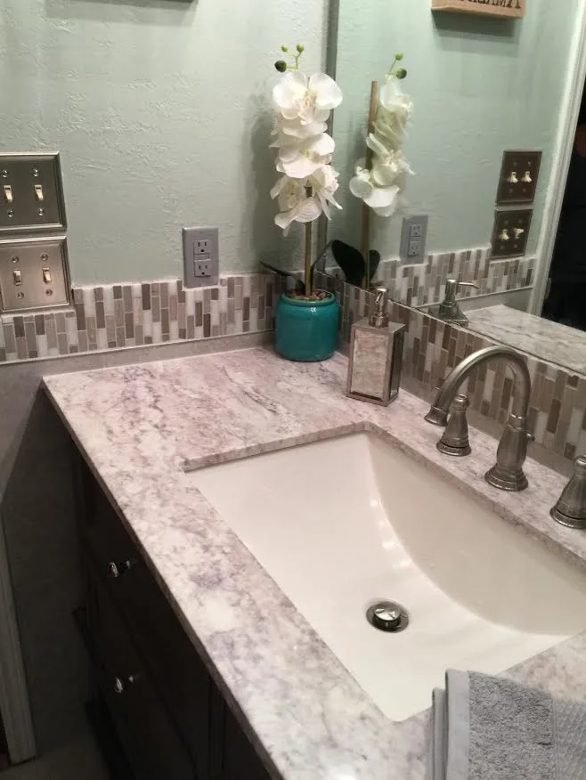 Compact Bathroom Makeover by The Glover Group, LLC - Photo 6
