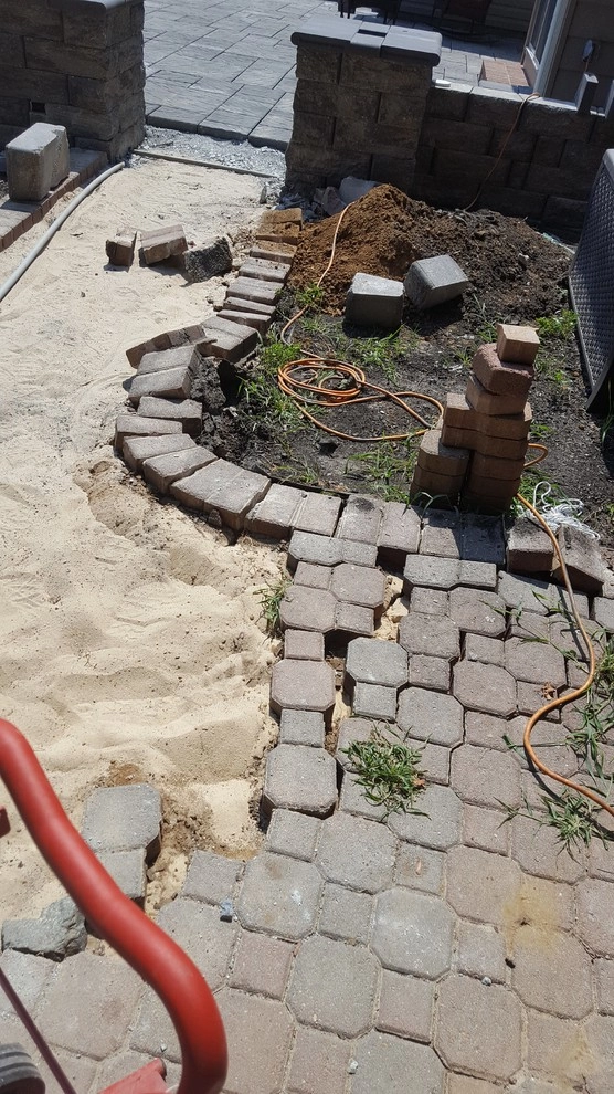 Stone Patio by RH Hilarios Landscaping LLC - Photo 20