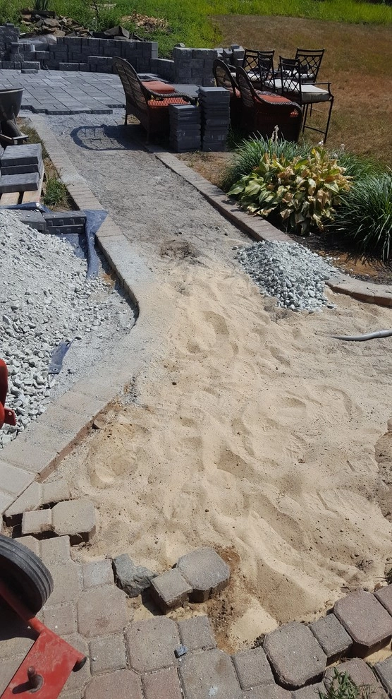 Stone Patio by RH Hilarios Landscaping LLC - Photo 13