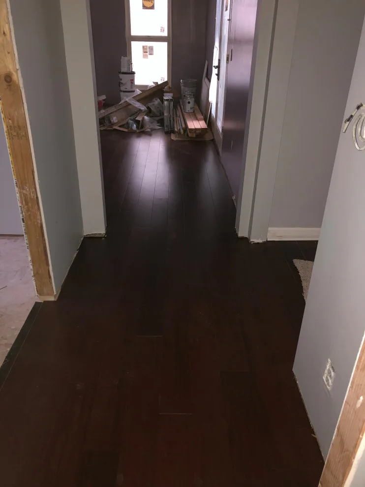 Fossilized Bamboo Floor Installation by Kiger Custom Creations - Photo 4