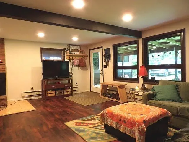 Living room renovation and structural restoration by West Bros Handyman - Photo 7