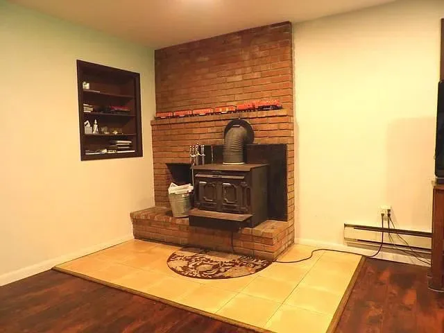 Living room renovation and structural restoration by West Bros Handyman - Photo 3