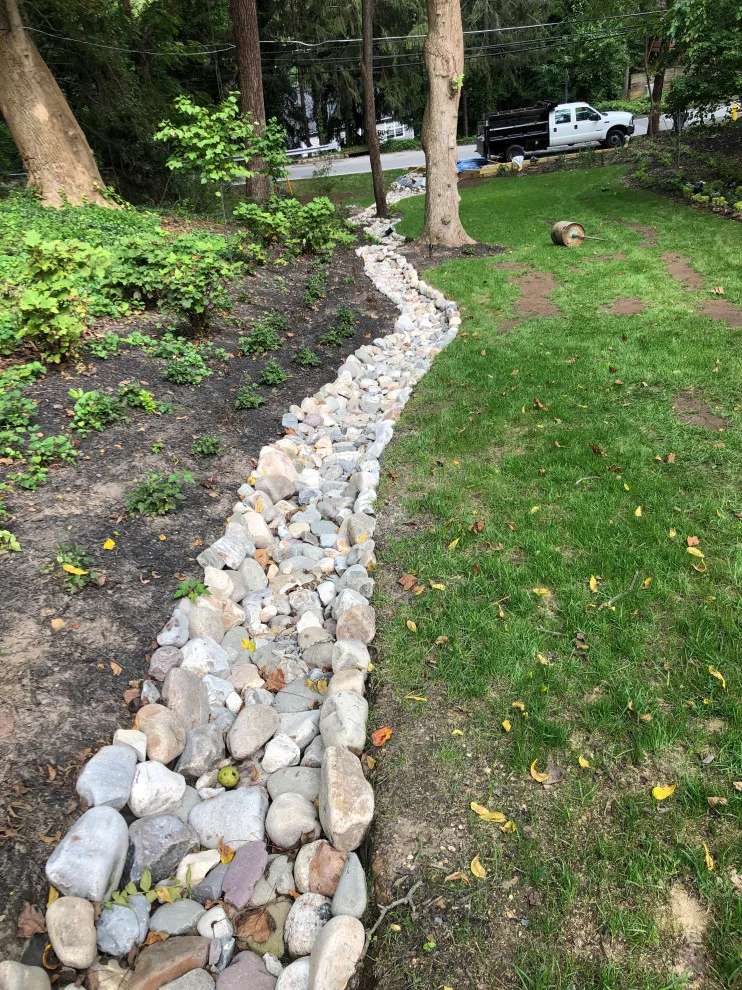 Drainage, Gutter Areas, and Grading by Brothers Designs LLC - Photo 9