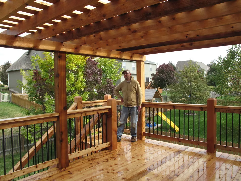 Cedar deck with pergola featuring arch knotty design by The Deck Pro - Photo 6