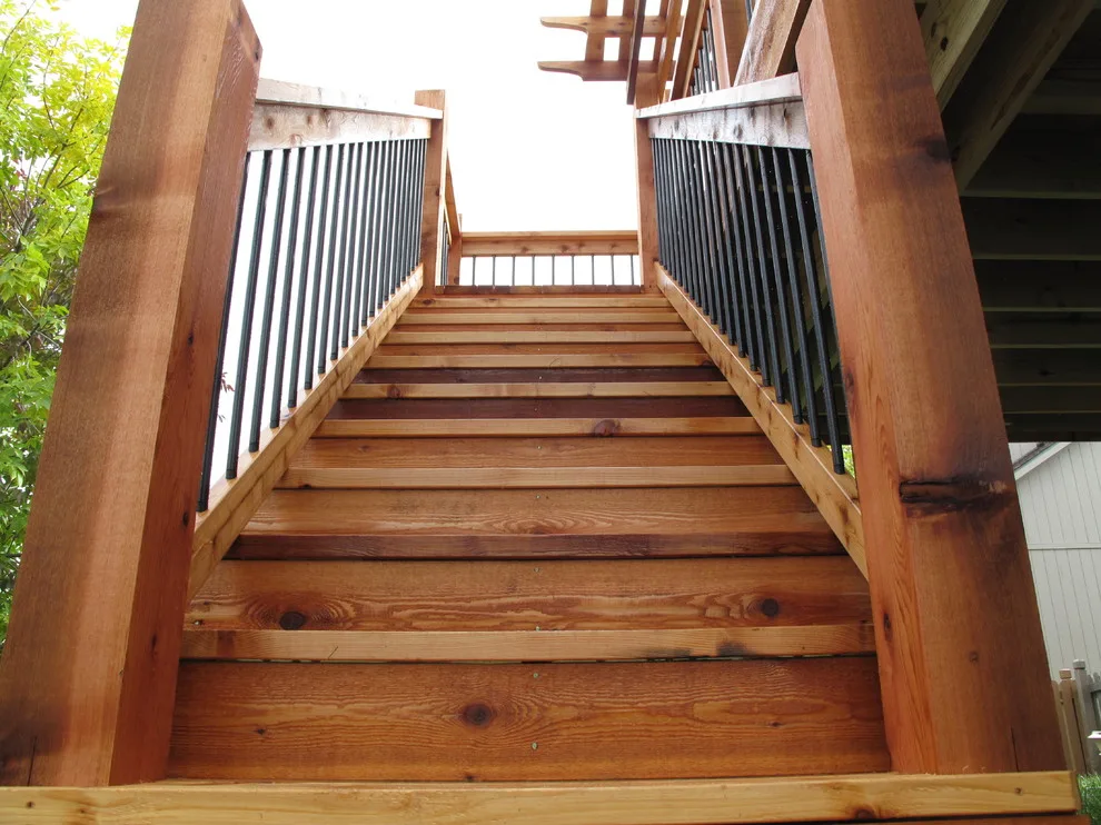 Cedar deck with pergola featuring arch knotty design by The Deck Pro - Photo 4