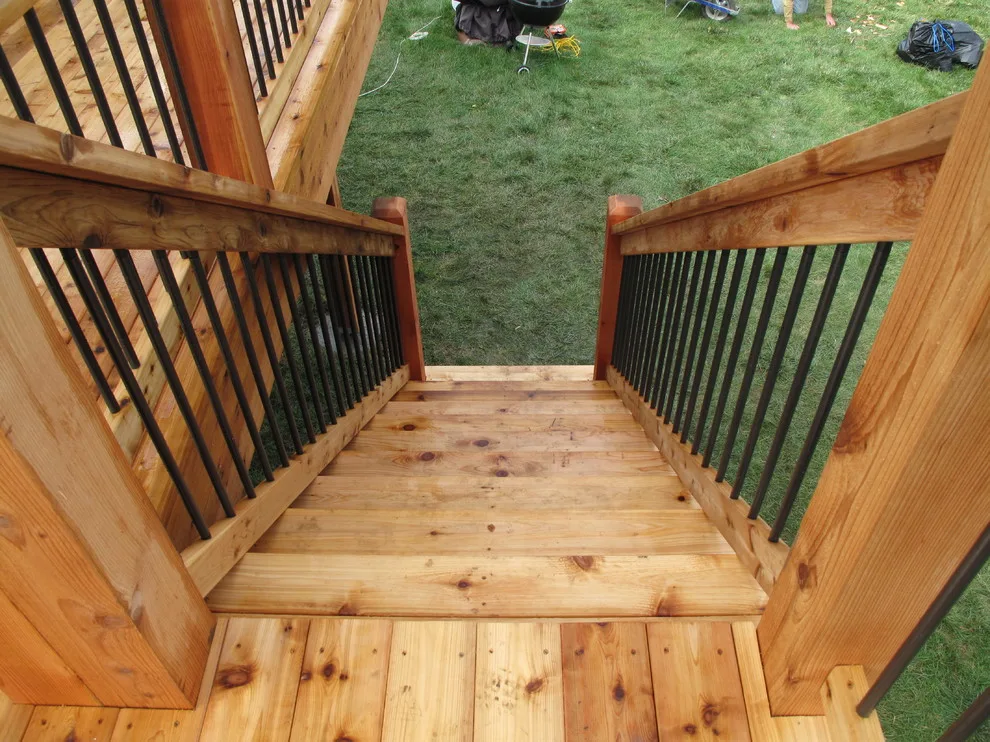 Cedar deck with pergola featuring arch knotty design by The Deck Pro - Photo 9