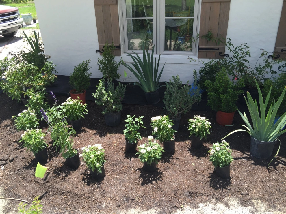 Landscaping by Rooted Landscape Services Of IRC LLC - Photo 16