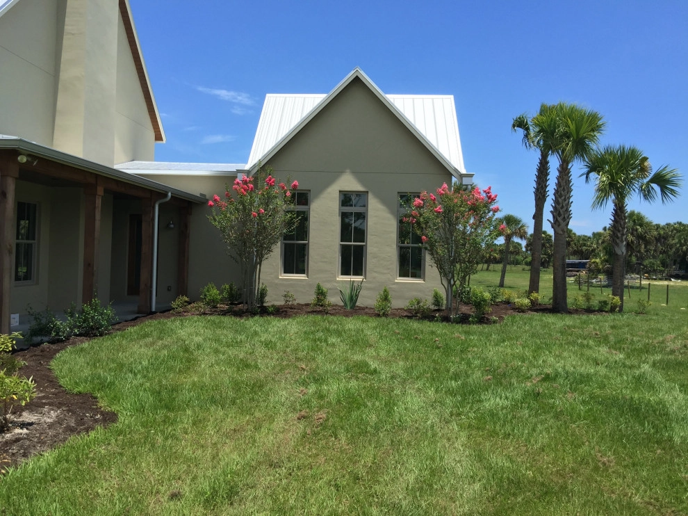 Landscaping by Rooted Landscape Services Of IRC LLC - Photo 4