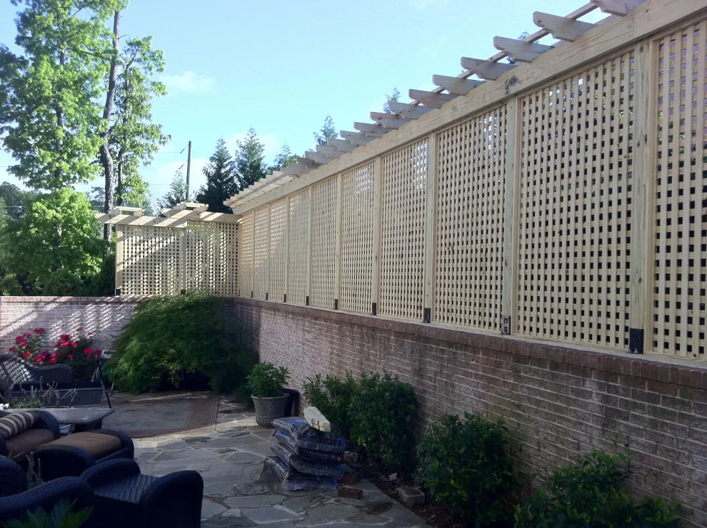 Appealing privacy barrier with a connected pergola by DeckThisOut - Photo 2