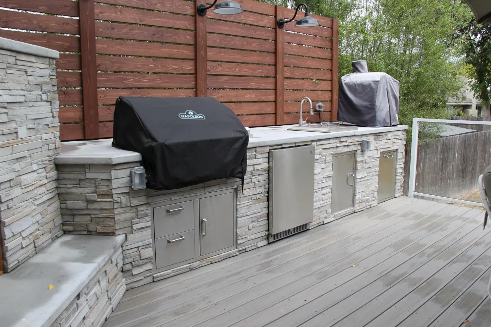 Contemporary Two-Tier Deck Featuring Custom Fireplace and Grill Area by Arroyo Grande Deck And Fence - Photo 6