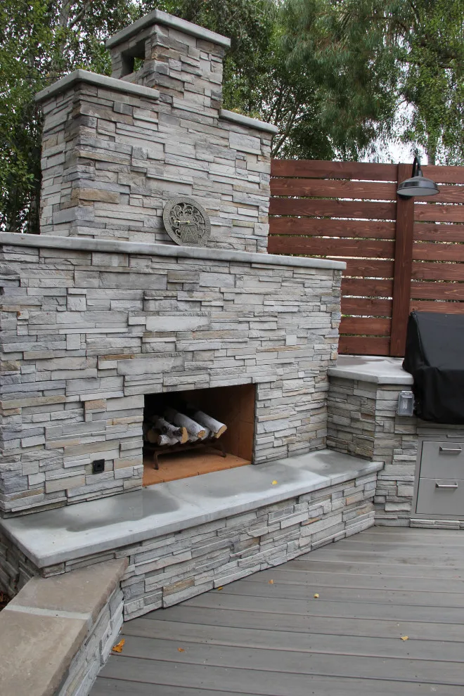 Contemporary Two-Tier Deck Featuring Custom Fireplace and Grill Area by Arroyo Grande Deck And Fence - Photo 5