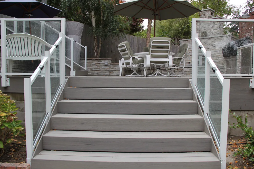 Contemporary Two-Tier Deck Featuring Custom Fireplace and Grill Area by Arroyo Grande Deck And Fence - Photo 4