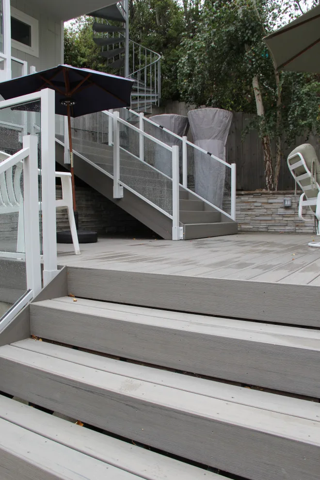 Contemporary Two-Tier Deck Featuring Custom Fireplace and Grill Area by Arroyo Grande Deck And Fence - Photo 8