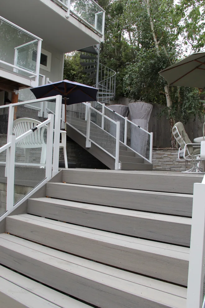 Contemporary Two-Tier Deck Featuring Custom Fireplace and Grill Area by Arroyo Grande Deck And Fence - Photo 9